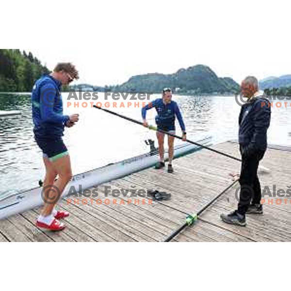 Nik Krebs and Jaka Cas and their coach Dusan Jurse during Slovenia Rowing team practice on Lake Bled, Slovenia on May 18, 2023