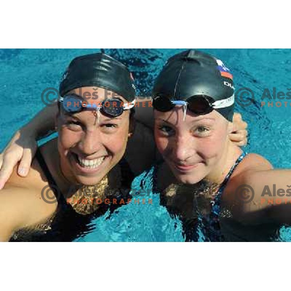 Anja Klinar and Anja Carman, members of the slovenian Olympic swimming team, at team practice session , Kodeljevo, Ljubljana , 28.07.2008 