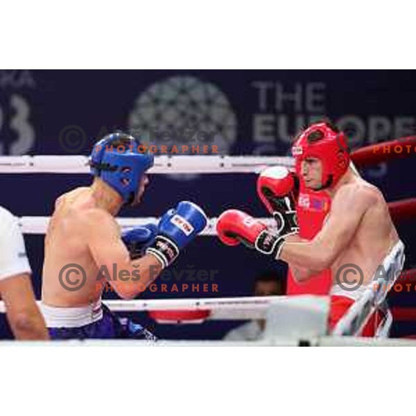 Luka Cengija (SLO, red) competes in Kickboxing - Men\'s Full Contact -75 kg at European Games 2023, Myslenice, Poland on June 30, 2023