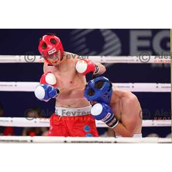 Luka Cengija (SLO, red) competes in Kickboxing - Men\'s Full Contact -75 kg at European Games 2023, Myslenice, Poland on June 30, 2023