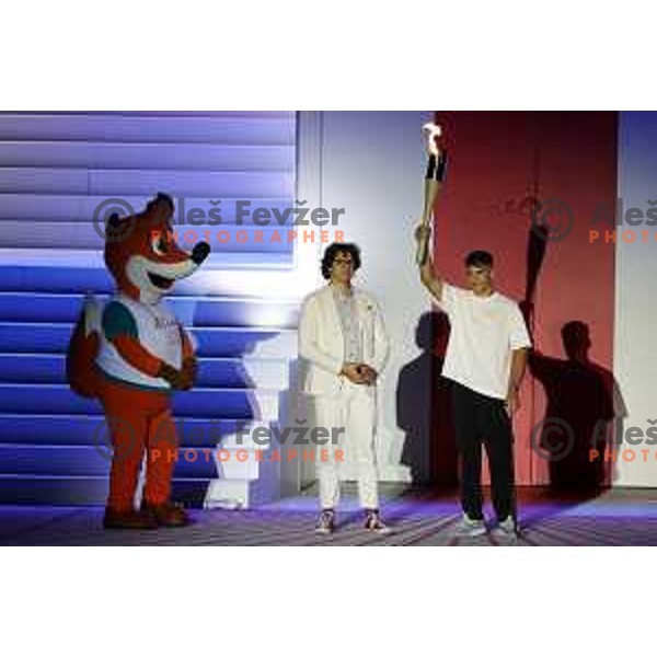 Rok Skrlep and Tim Marvot with Olympic torch at Opening Ceremony of EYOF 2023 in Maribor, Slovenia on July 23, 2023