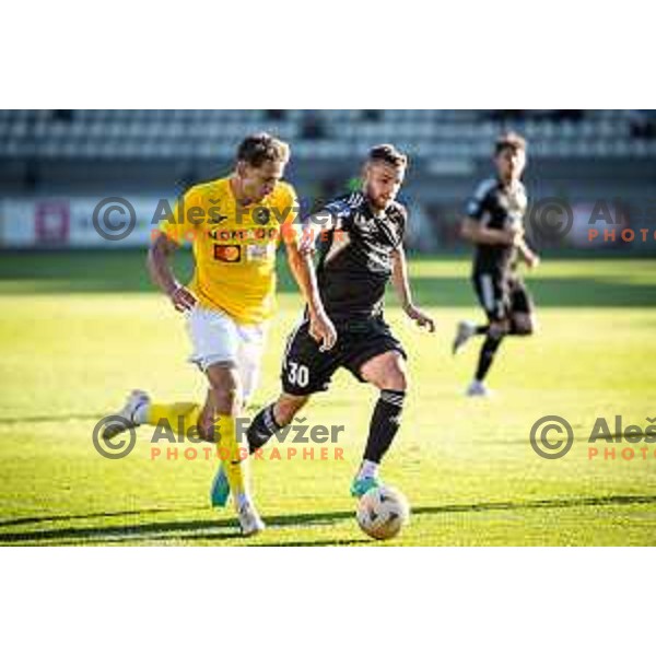 Gasper Trdin vs Almin Kurtovic in action during Prva liga Telemach football match between Mura and Bravo in Fazanerija, Murska Sobota, Slovenia on September 16, 2023. Photo: Jure Banfi