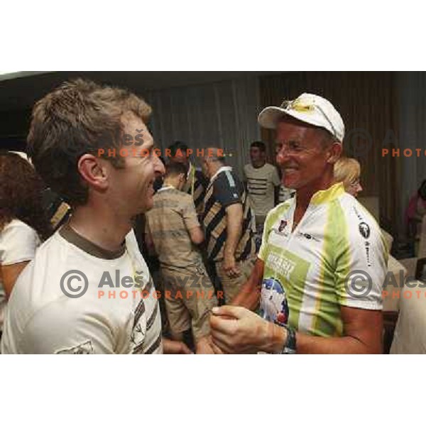 Tadej Valjavec talks to Radovan Skubic- Hilarij in Slovenian house in Beijing, China 9.8.2008 