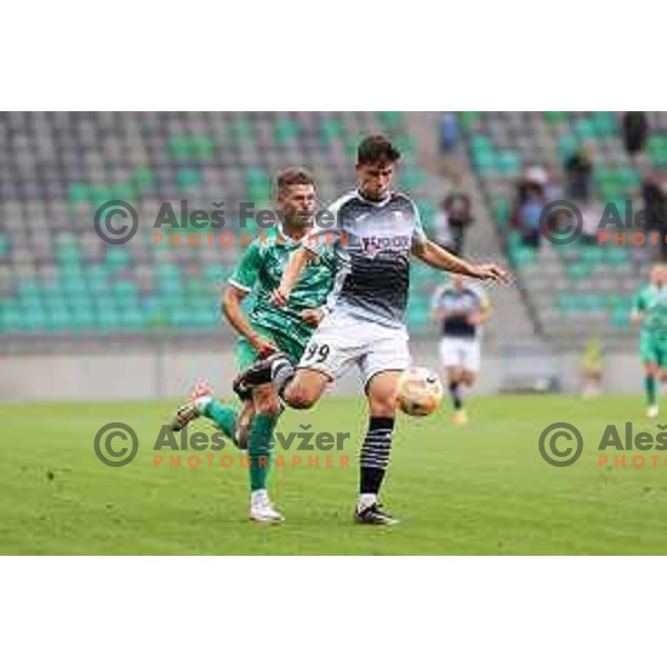 Dominik Prpic and Raul Alexander Florucz in action during Prva Liga Telemach 2023/2024 football match between Olimpija and Radomlje in Ljubljana, Slovenia on October 8, 2023. Foto: Filip Barbalic