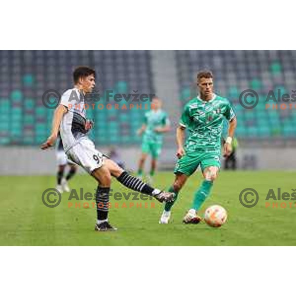 Dominik Prpic and Raul Alexander Florucz in action during Prva Liga Telemach 2023/2024 football match between Olimpija and Radomlje in Ljubljana, Slovenia on October 8, 2023. Foto: Filip Barbalic