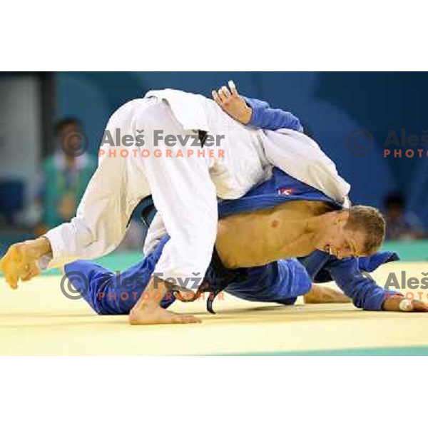 Rok Draksic (SLO, blue) in first round fight in judo tournament in category under 60 kg at Olympic Games, Beijing, China 9.8.2008. 