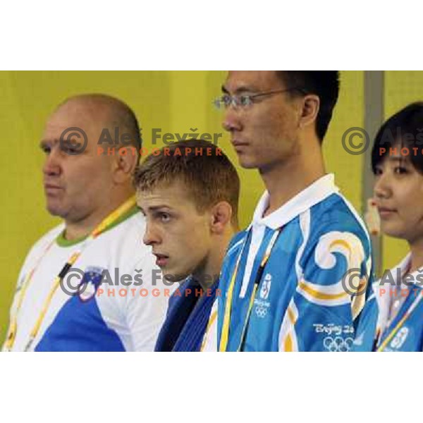 Rok Draksic (SLO, blue) in first round fight in judo tournament in category under 60 kg at Olympic Games, Beijing, China 9.8.2008. 