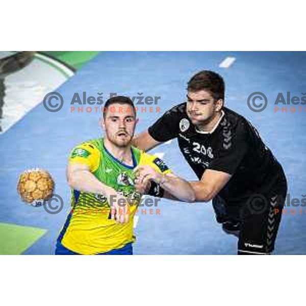 Mitja Janc vs Jernej Drobez in action during 1.NLB league handball match between Celje Pivovarna Lasko and Gorenje Velenje in Dvorana Zlatorog, Celje, Slovenia on October 14, 2023. Photo: Jure Banfi