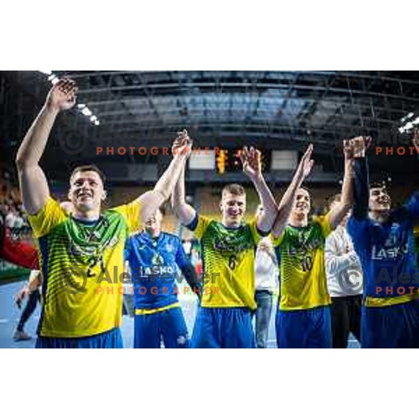 Leon Gregoric, Tadej Mazej, Tim Cokan celebrating after winning 1.NLB league handball match between Celje Pivovarna Lasko and Gorenje Velenje in Dvorana Zlatorog, Celje, Slovenia on October 14, 2023. Photo: Jure Banfi