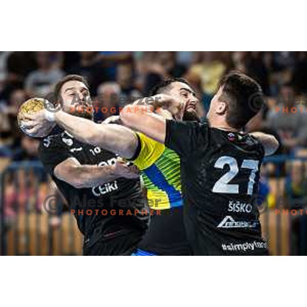 Urban Pipp vs Stefan Zabic in action during 1.NLB league handball match between Celje Pivovarna Lasko and Gorenje Velenje in Dvorana Zlatorog, Celje, Slovenia on October 14, 2023. Photo: Jure Banfi