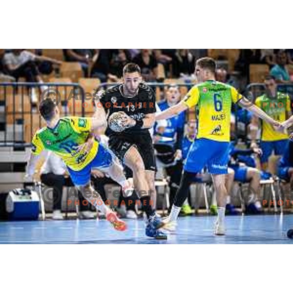 Tarik Velic in action during 1.NLB league handball match between Celje Pivovarna Lasko and Gorenje Velenje in Dvorana Zlatorog, Celje, Slovenia on October 14, 2023. Photo: Jure Banfi