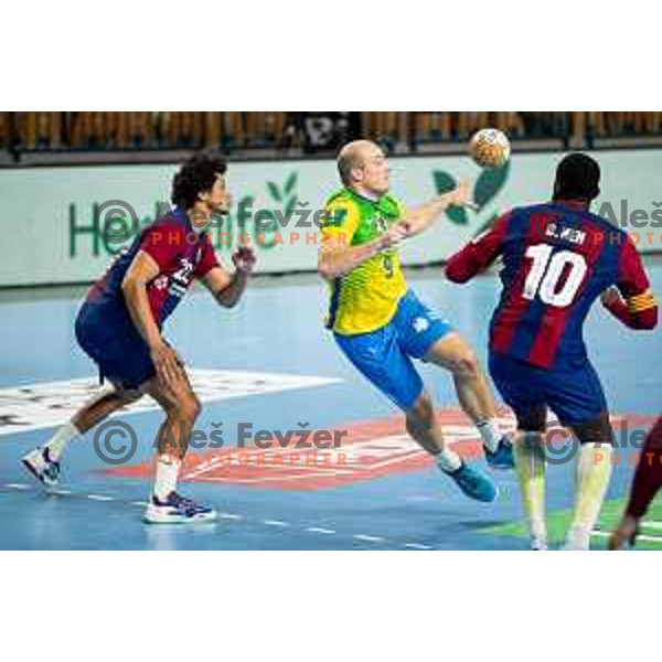 Grega Krecic in action during EHF Champions League handball match between Celje Pivovarna Lasko and Barcelona handball in Zlatorog Arena, Celje, Slovenia on October 18, 2023.