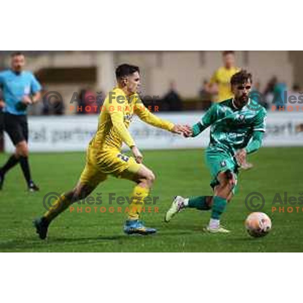 Nick Perc and Diogo Costa Pinto in action during Prva Liga Telemach 2023/2024 football match between Domzale and Olimpija in Domzale, Slovenia on October 21, 2023. Foto: Filip Barbalic