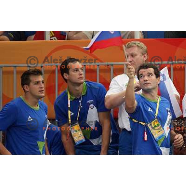 Slovenian swimmers Godec, Markic, Mankoc cheering for Sara Isakovic in the final of 200 meters frestyle at Olympic games, Beijing, China 13.8.2008 