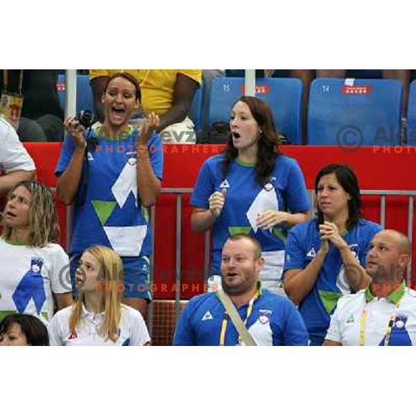 Slovenian swimmers Sovinek, Klinar, Carman cheering for Sara Isakovic in the final of 200 meters freestyle race at Olympic games in Beijing, China 13.8.2008 