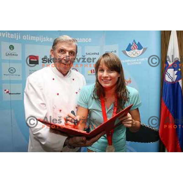 Jozef Oseli and Sara Isakovic at reception in Slovenian house after she won silver medal in swimming at Olympic games in Beijing, China 13.3.2008 