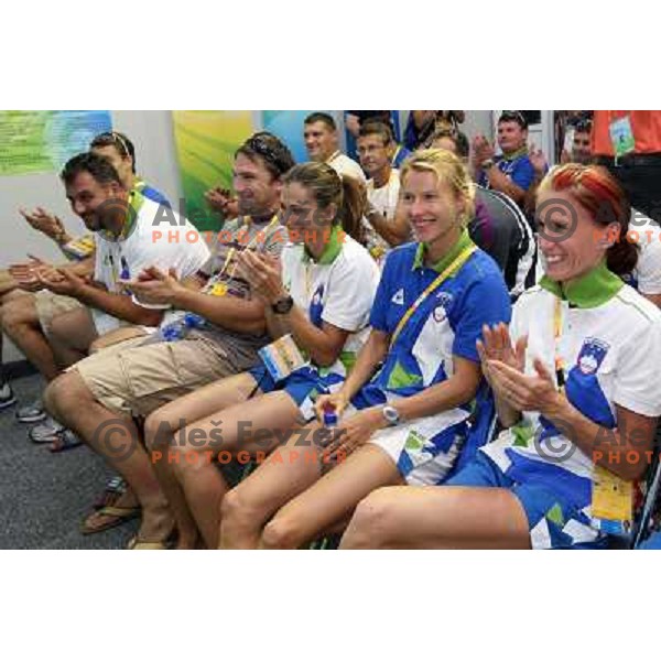 Sara Isakovic receives congratulations from slovenian athletes at press conference in Olympic Village 13.8.2008 