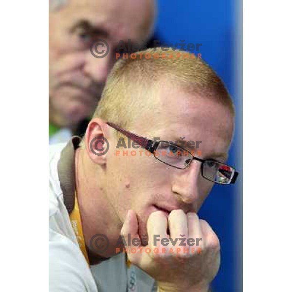 Matic Osovnikar watches Sara Isakovic receives congratulations from slovenian athletes at press conference in Olympic Village 13.8.2008 