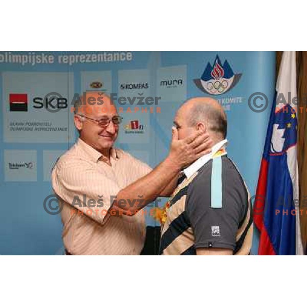 Bogdan Gabrovec and Marjan Fabjan at the Reception in Slovenian house for Lucija Polavder who won bronze olympic medal in judo category +78 kg at olympic games in Beijing, China 15.8.2008 