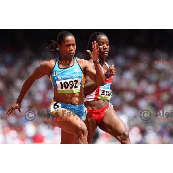 Chandra Sturrup (BAH,1092) and Semoy Hackett (TRI,3015) in qualification of 100 meters at Olympic games in Beijing, China 16.8.2008 
