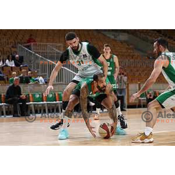 Marko Radovanovic and Justin Cobbs in action during ABA League 2023-2024 regular season basketball match between Cedevita Olimpija and Krka in Ljubljana, Slovenia on December 16, 2023. Foto: Filip Barbalic