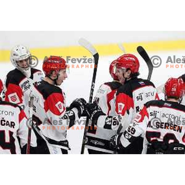 Players of SIJ Acroni Jesenice celebrate victory at the Slovenian Championships 2023/2024 ice-hockey match between SZ Olimpija and SIJ Acroni Jesenice in Ljubljana, Slovenia on January 30, 2024