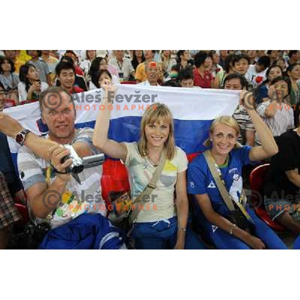 Srdjan Djordjevic, Pia Tajnikar and Sabina Veit cheering for Marija Sestak (SLO) who was placed sixth in women\'s triple jump at the Olympic games in Beijing, China 17.8.2008 