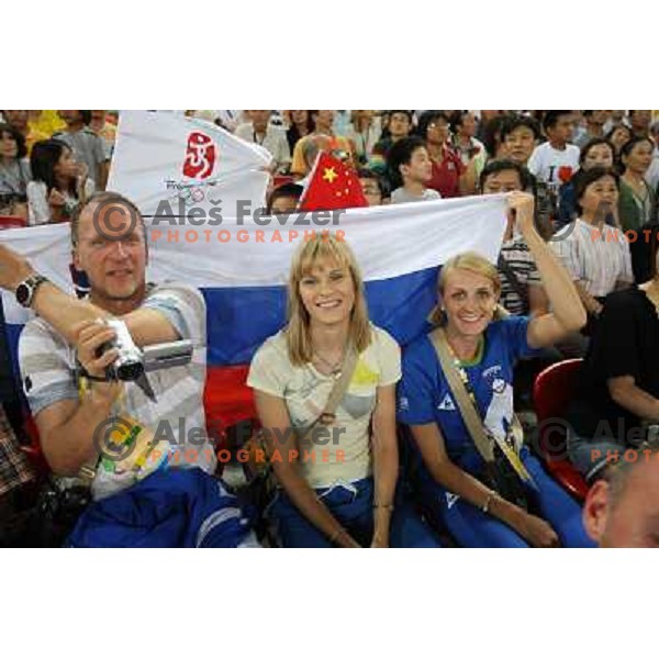 Srdjan Djordjevic, Pia Tajnikar and Sabina Veit cheering for Marija Sestak (SLO) who was placed sixth in women\'s triple jump at the Olympic games in Beijing, China 17.8.2008 