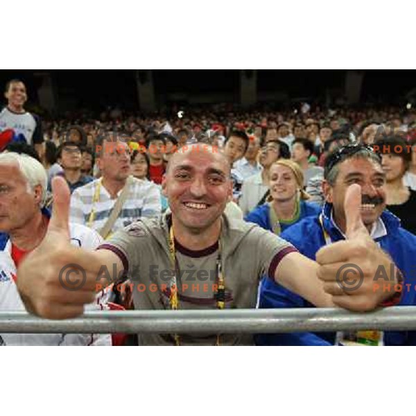Matija Sestak, coach and husband of Marija Sestak (SLO) watches her taking sixth place in women\'s triple jump at the Olympic games in Beijing, China 17.8.2008 