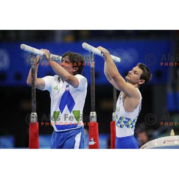 Coach Edi Kolar (left) and Mitja Petkvsek (SLO) before exercise with which Petkovsek took fifth place in the final of Appartaus at Olympic games in Beijing, China 19.8.2008 Photo by Ales Fevzer 