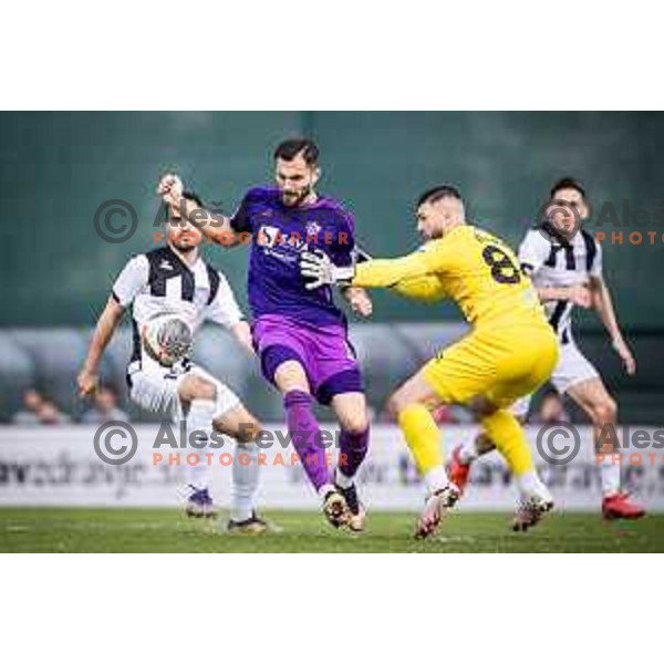 Maks Barisic vs Ajdin Mulalic in action during Prva liga Telemach football match between Rogaska and Maribor in Sportni center Rogaska Slatina, Slovenia on February 25, 2024. Photo: Jure Banfi