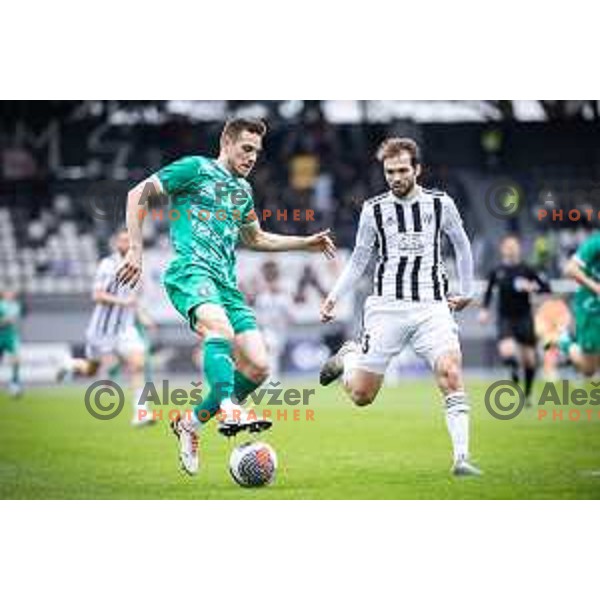 Timi Max Elsnik vs Klemen Pucko in action during Prva liga Telemach football match between Mura and Olimpija in Fazanerija, Murska Sobota, Slovenia on March 10, 2024. Photo: Jure Banfi