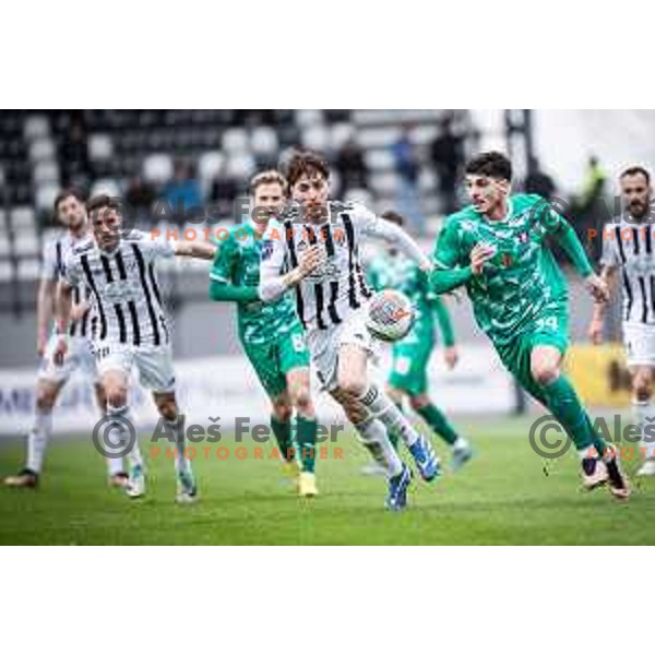 Filippo Tripi vs Agustin Doffo in action during Prva liga Telemach football match between Mura and Olimpija in Fazanerija, Murska Sobota, Slovenia on March 10, 2024. Photo: Jure Banfi
