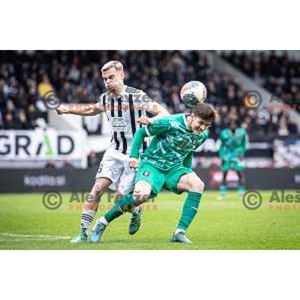 Aljaz Antolin vs Marko Brest in action during Prva liga Telemach football match between Mura and Olimpija in Fazanerija, Murska Sobota, Slovenia on March 10, 2024. Photo: Jure Banfi