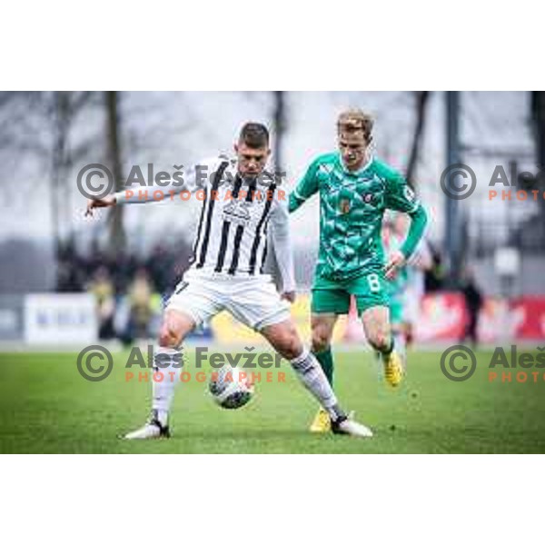 Amadej Marosa vs Justas Lasickas in action during Prva liga Telemach football match between Mura and Olimpija in Fazanerija, Murska Sobota, Slovenia on March 10, 2024. Photo: Jure Banfi