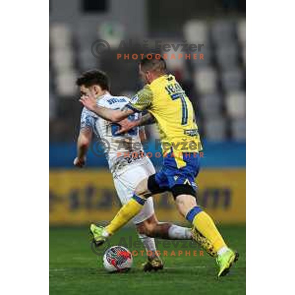 Tamar Svetlin and Enej Jelenic in action during Prva liga Telemach 2023/2024 football match between Koper and Celje in Koper, Slovenia on March 14, 2024
