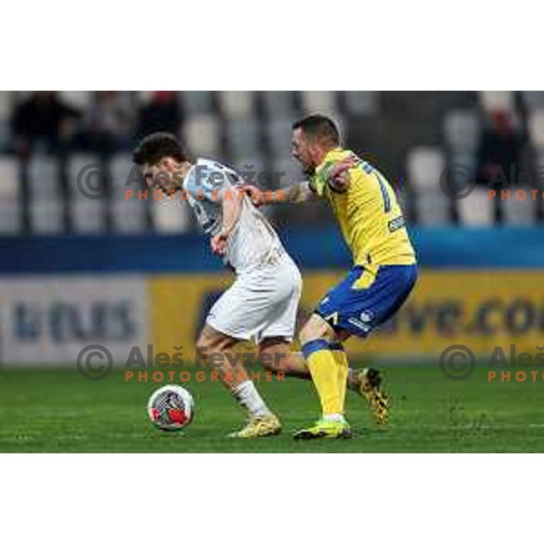 Tamar Svetlin and Enej Jelenic in action during Prva liga Telemach 2023/2024 football match between Koper and Celje in Koper, Slovenia on March 14, 2024