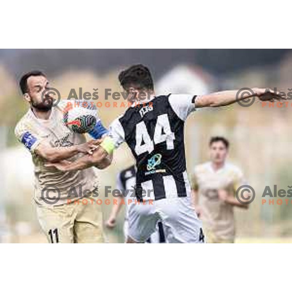 Ziga Kous vs Zan Flis in action during Prva liga Telemach football match between Rogaska and Mura in Sportni center Rogaska Slatina, Slovenia on March 17, 2024. Photo: Jure Banfi