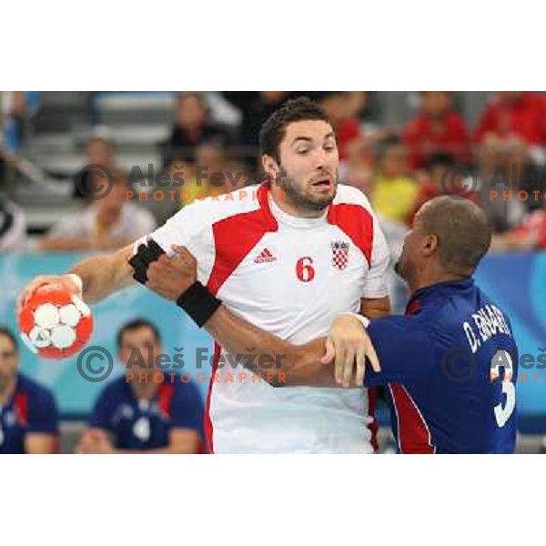 Blazenko Lackovic (CRO) and Didicer Dinart (FRA) at handball match France- Croatia in semi-final of Olympic games in Beijing, China 22.8.2008. France won 25:23 and advanced to the Final 