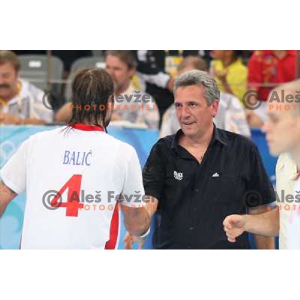 Ivano Balic (CRO) congratulates Claude Onesta (FRA) after handball match France- Croatia in semi-final of Olympic games in Beijing, China 22.8.2008. France won 25:23 and advanced to the Final 