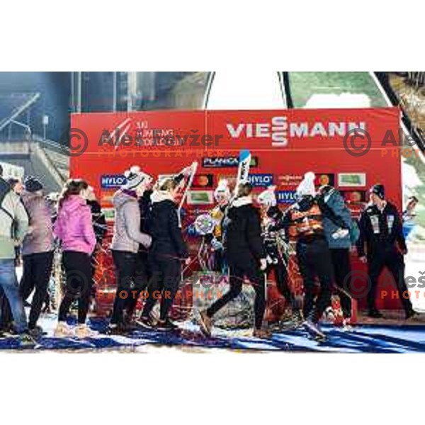 Nika Prevc of Slovenia, overall winner of Women\'s Ski jumping World Cup celebrate with teammates in Planica, Slovenia on March 21, 2024