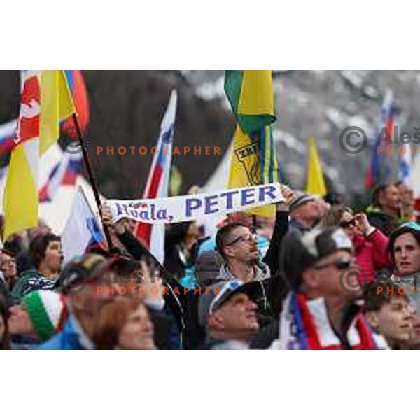 Slovenian fans with flags and banners support ski jumpers at Team Competition during the Final of the World Cup ski jumping in Planica, Slovenia on March 23, 2024