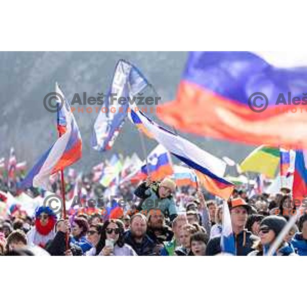 Slovenian fans with flags and banners support ski jumpers at Team Competition during the Final of the World Cup ski jumping in Planica, Slovenia on March 23, 2024