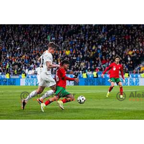 Jaka Bijol of Slovenija vs Otavio of Portugal in action during Friendly football match between Slovenia and Portugal in Stadium Stozice, Slovenia on March 26, 2024. Photo: Grega Valancic