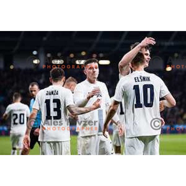 Jaka Bijol of Slovenia and Timi Max Elsnik of Slovenia in action during Friendly football match between Slovenia and Portugal in Stadium Stozice, Slovenia on March 26, 2024. Photo: Grega Valancic