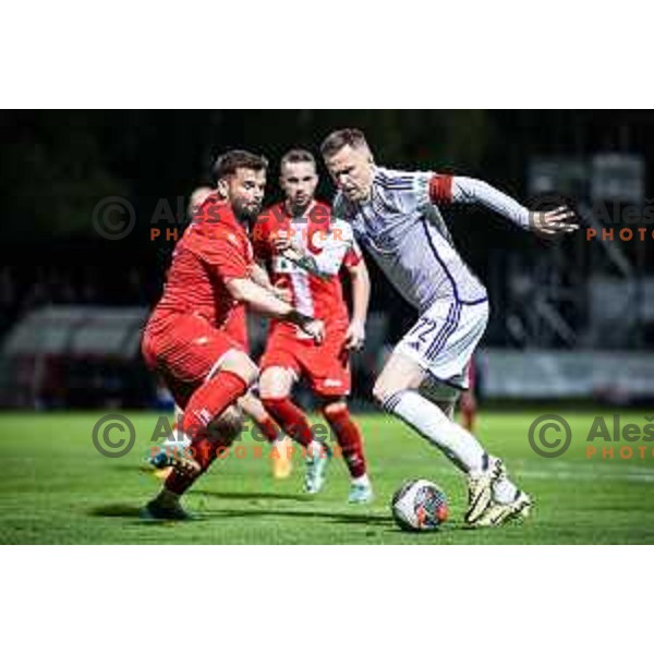 Janez Pisek vs Josip Ilicic in action during Prva liga Telemach football match between Aluminij and Maribor in Sportni park Aluminij, Kidricevo, Slovenia on April 5, 2024. Photo: Jure Banfi