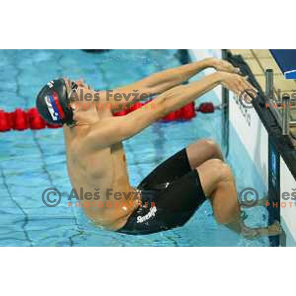 Blaz Medvesek of Slovenia swims at 200 meters backstroke at Athens 2004 Summer Olympic games on August 18, 2004