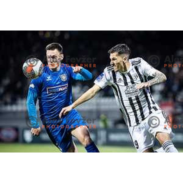 Luka Kambic vs Alexandros Kyziridis in action during Slovenian cup 2023/2024 semi final football match between Mura and Rogaska in Fazanerija, Murska Sobota, Slovenia on April 25, 2024. Photo: Jure Banfi