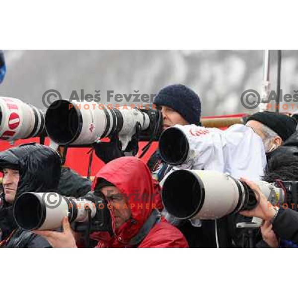 Fotografi delajo v dezju