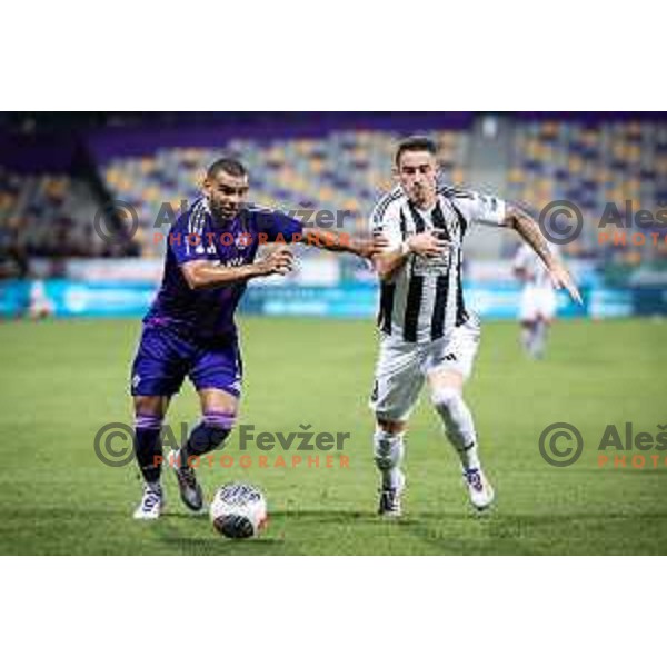 Hilal Soudani vs Dario Vizinger in action during Prva liga Telemach 2024/25 football match between Maribor and Mura in Ljudski vrt, Maribor, Slovenia on August 11, 2024. Photo: Jure Banfi